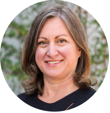 Picture of Virginie Cobigo, a white woman with brown hair, brown eyes and a nice smile.